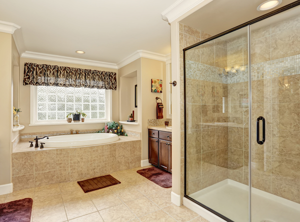luxurious bathtub shower and vanity cabinet.