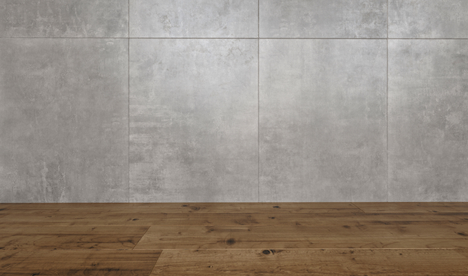 grey tiles on the wall of a room with a hardwood floor